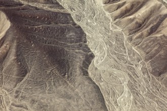 Ancient lines and patterns in a dry desert landscape, the geoglyphs and drawings in the desert near