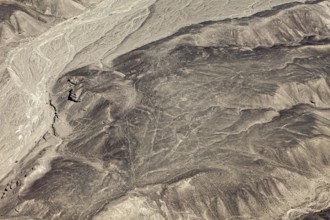 Dry desert with puzzling lines that cover the mountain and form geometric figures, the geoglyphs