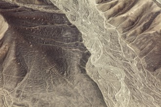 Barren desert hills with clear line formations from the air, the geoglyphs and images in the desert