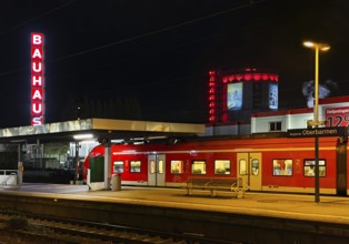 Local train at Oberbamen station with gas boiler at night, Wuppertal, North-Rhine Westphalia,