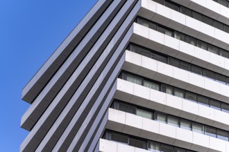 From below image captures the essence of modern architecture through the details of a building's
