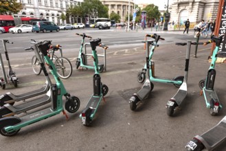 Budapest, Hungary. October 1st 2023 A group of Swap rental scooters parked on the pavement in