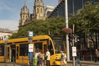 Budapest, Hungary. October 1st 2023 Passengers board a Hungarian city tram outside the Nyugati