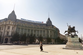 Bucharest, Romania. October 29th 2023. A woman walks past the Banca Comerciala Romana, (BCR) a