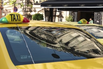 Bucharest, Romania. October 29th 2023. Romanian Taxi cabs parked outside a popular restaurant in