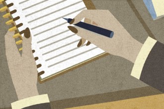 A person writes in a notebook using a pen, focusing intently on the task The setting is a