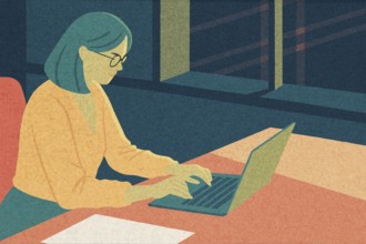 A business professional is focused on tasks at a laptop in a contemporary office The setting is