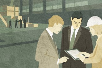 Three professionals consult over a tablet in a warehouse, surrounded by stacks of boxes Colleagues