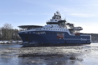Service vessel, residential ship, offshore ship WIND OF HOPE sails in the icy Kiel Canal, NOK, Kiel