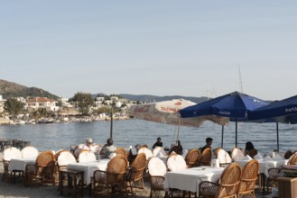 Bodrum, Turkey. April 23rd 2022 Turkish restaurant on the beach of Bodrum harbour, a popular