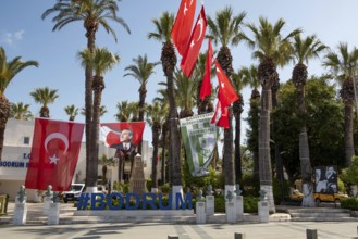 Bodrum, Mugla, Turkey. April 21st 2022 Hash Tag Bodrum city centre sign under Turkish flags and