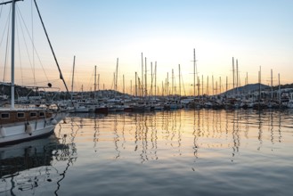 Bodrum, Turkey. April 23rd 2022 Beautiful sunset yachts moored in Bodrum Harbor, Turkish Aegean