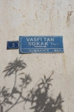 Bodrum, Turkey. April 23rd 2022 Pretty blue street sign with shadows, a typical traditional lane in