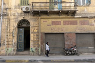 Alexandria, Egypt. December 2nd 2022 Street scene and typical faded architecture of the Egyptian