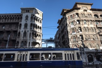 Alexandria, Egypt. December 4th 2022 Historical architecture and old tram passing in typical