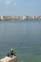 Alexandria, Egypt. December 1st 2022 A local fisherman on the Mediterranean coastal city of