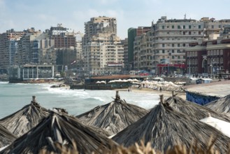 Alexandria, Egypt. December 2nd 2022 Apartment buildings and informal beach side stalls and