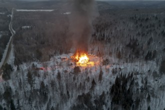House fire in a forest area, Region of La Mauricie, Province of Quebec, Canada