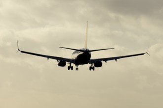 Boeing 737 commercial passenger airliner jet aircraft of Ryanair airways in flight on approach to