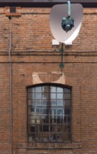 Brick building with factory window of gondolas, Giudecca, Ventien, Italy