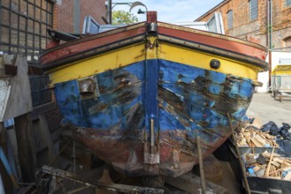 Old barge at a shipyard, Italy