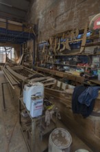 Workbench with spare parts for gondolas, boatyard, Giudecca, Veneto, Italy