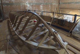 Construction of a commercial boat for Venice in a shipyard, Giudecca, Veneto, Italy