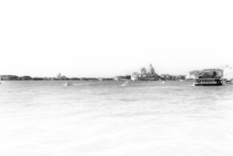 Santa Maria Salute seen from the water, black and white, Venice, Veneto, Italy