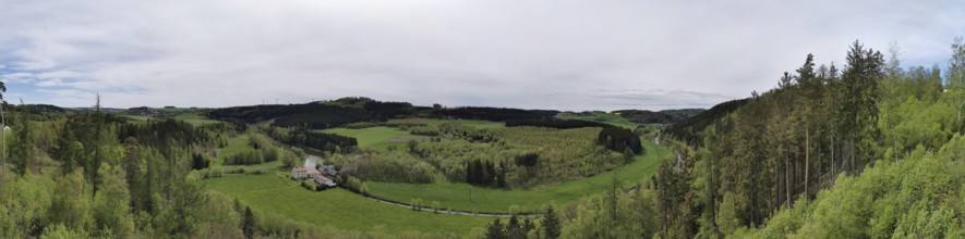 Panorama, far-reaching view over green meadows, fields and wooded hills, hiking on the Rennsteig,