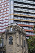 Batumi, Georgia. July 21st 2025. Old traditional style Georgian architecture and modern skyscraper