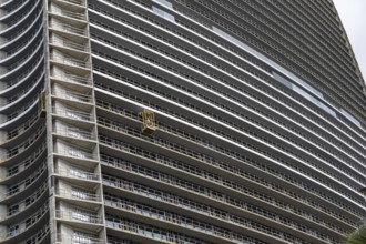 Batumi, Georgia. July 21st 2025. A construction worker working on a modern high-rise building