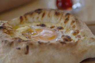 Acharuli-Ajarian Khachapuri, the most popular street food in Georgia, a famous breakfast dish made