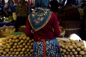 Selcuk, Turkey. 4th July 2015. A local woman working in the weekly farmers Bazaar, Selcuk, Turkey