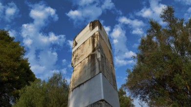 Ancient wall against cloudy sky and surrounded by trees, Archaeological Site, Ancient Olympia,