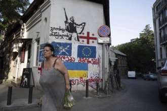 Tbilisi, Georgia. August 26th 2025. The Georgian, Ukrainian and European Union flags and political
