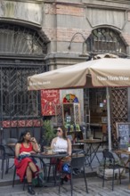 Tbilisi, Georgia. September 12th 2025 Enjoying a glass of Georgian wine outside a wine bar café in