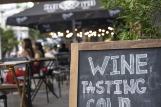 Tbilisi, Georgia. September 12th 2025 Georgian wine tasting sign outside a wine bar café in the Old