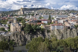 Tbilisi, Georgia. September 12th 2025 Dramatic cliff side view of Tbilisi with the Metekhi Church