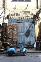 Cairo, Egypt. April 15th 2025. A cool looking blue Vespa style motor scooter, a popular mode of