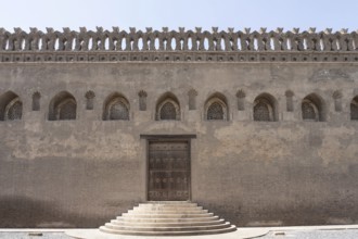 Entrance door and decorative wall of the Tulunid Dynasty Mosque of Ibn Tulun in the Islamic Quarter