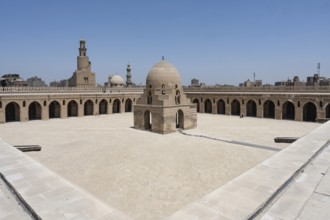 The magnificent architecture of the courtyard, dome and minarets of Ibn Tulun Mosque in Islamic
