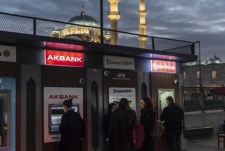 Istanbul, Turkey 8th January 2025 Customers using Turkish bank ATM's near the Bosporus on the