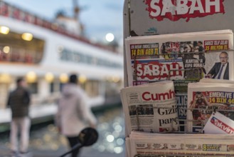 Istanbul, Turkey. January 8th 2025. Turkish daily newspapers displayed on a stand at Karakoy Ferry