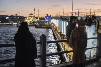 Istanbul, Turkey. January 3rd 2025. Tourists and locals gather at sunset on the iconic Galata