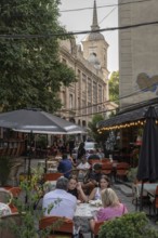 Tbilisi, Georgia. July 29th 2025. Locals and tourists enjoying the café culture of the Old Town in
