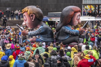 Rose Monday procession in Düsseldorf, theme car by wagon manufacturer Jacques Tilly, topic of