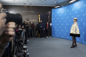 Pamela Anderson (actress) in front of photographers at a photocall for the film Rosebush Pruning at