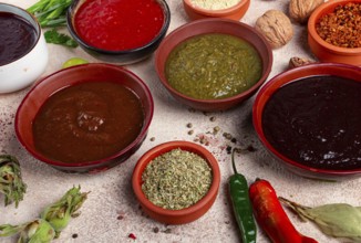 Assortment of Georgian sauces and spices, top view, set of spices and tkemali, Georgian, food
