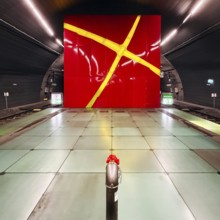 Lohring subway station with red enamelled wall with a painted light cross by Eva-Maria Jöressen,