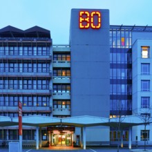 Main building of Bochum University with red BO logo in the evening, Central Campus, Bochum, Ruhr